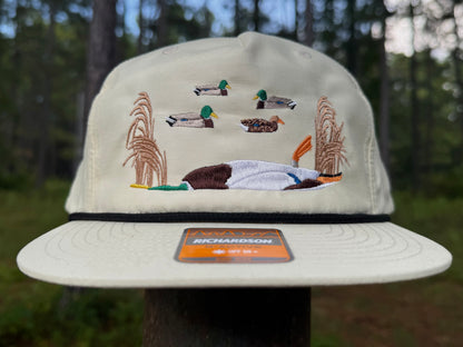 Banded mallard belly up