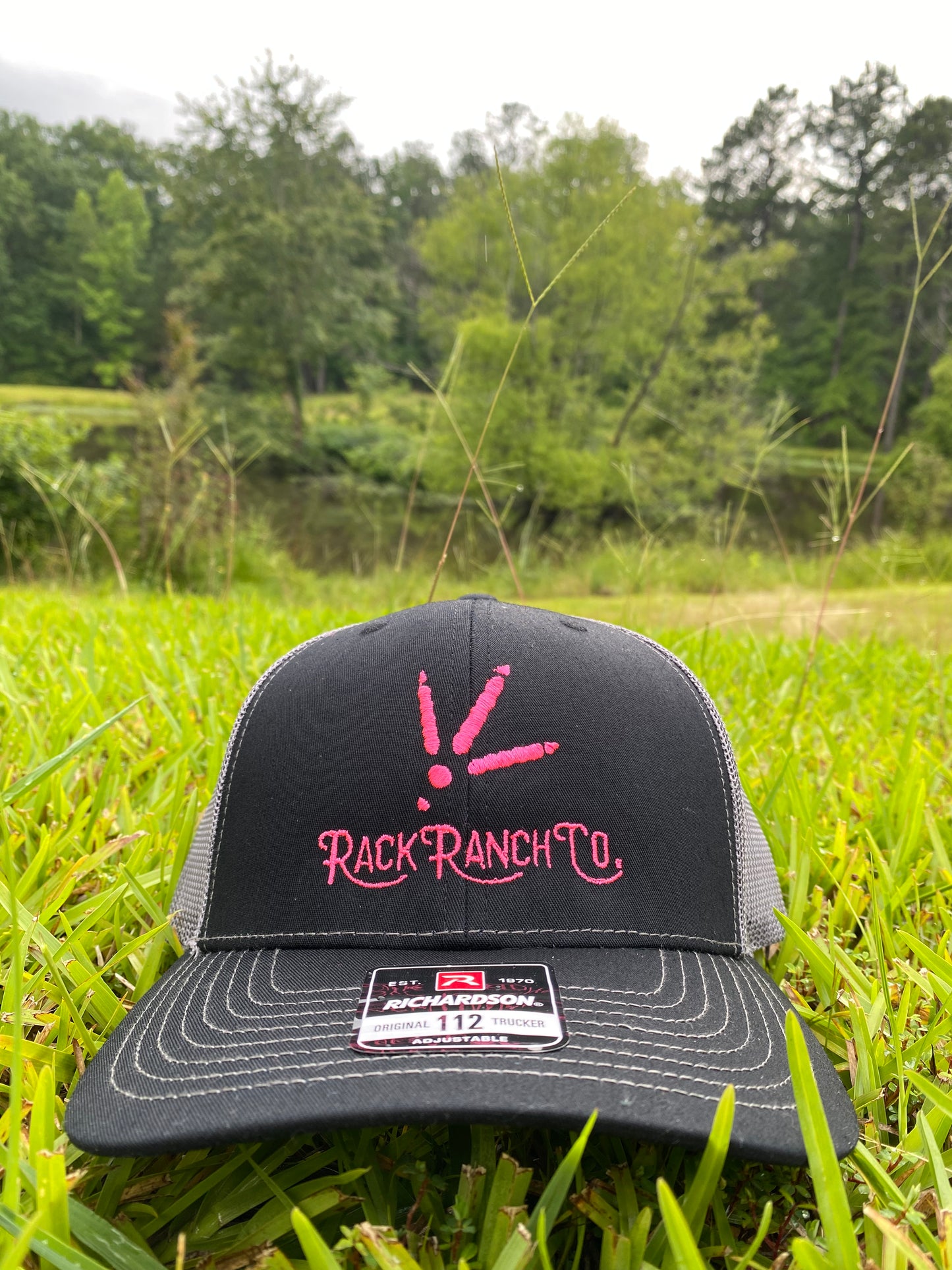 Pink thread logo hat