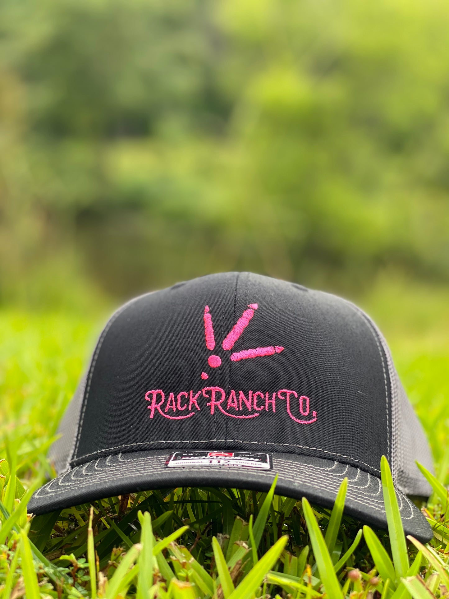 Pink thread logo hat